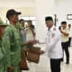 Perkuat Perlindungan Masyarakat, Bupati Oskar Manoppo Kukuhkan Satlinmas dan Relawan Pemadam Kebakaran 125 Foto A Boltim Satlinmas