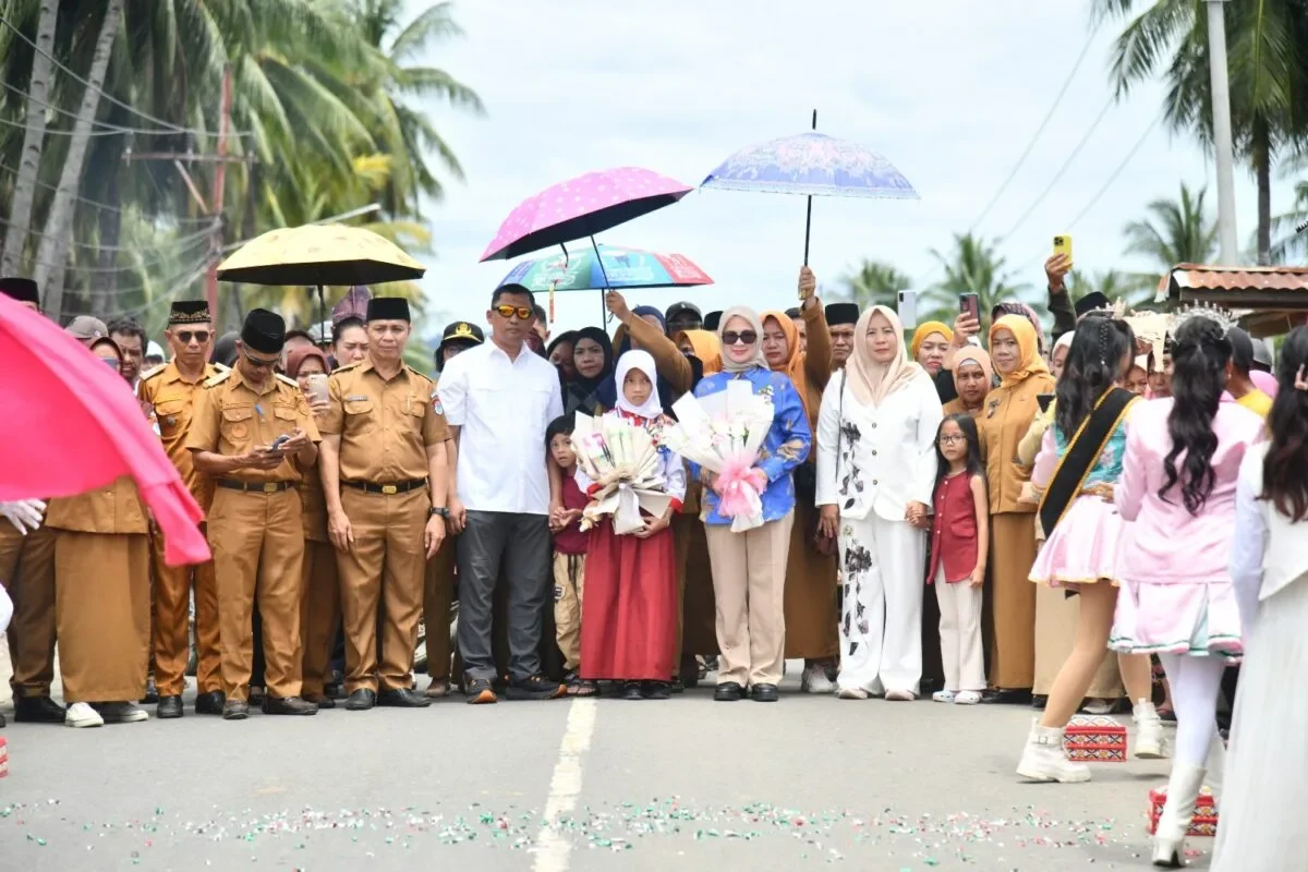 Bawa Pulang Medali Emas, Dewi Athena Disambut Bupati dan Wakil Bupati Boltim 120 IMG 20251027 WA0051