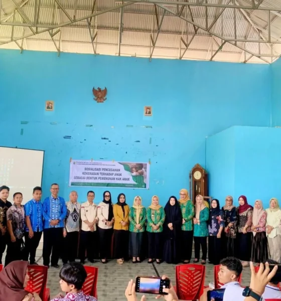 Foto bersama Dinas DP3A Kotamobagu dan Pserta usai giat Sosialisasi (Foto, Ist)