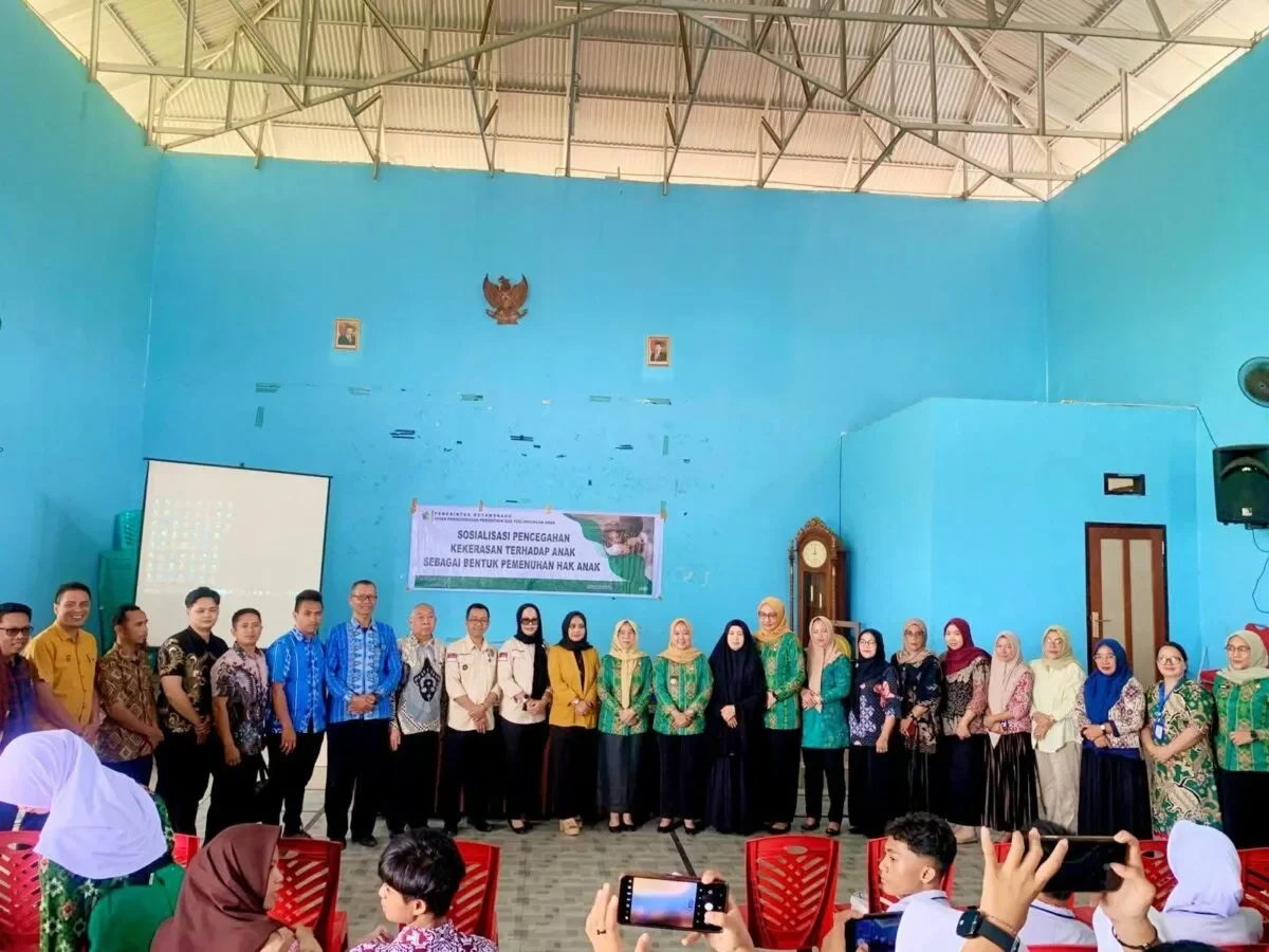 Foto bersama Dinas DP3A Kotamobagu dan Pserta usai giat Sosialisasi (Foto, Ist)